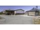 Exterior view of home with long driveway, outbuildings, and covered gazebo at 10622 N Malachite Way, Casa Grande, AZ 85122