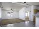 Open living space with carpeted and laminate flooring, adjacent to the kitchen at 10622 N Malachite Way, Casa Grande, AZ 85122