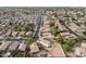 This property features a backyard pool, well-manicured lawn, and is conveniently located near a community lake at 11405 W Windsor Ave, Avondale, AZ 85392