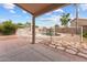 Backyard featuring a covered patio with pool, and desert landscaping at 11405 W Windsor Ave, Avondale, AZ 85392