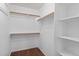 Walk-in closet with wood floors and plenty of room for storage and organization at 11405 W Windsor Ave, Avondale, AZ 85392