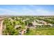 Scenic aerial view of neighborhood featuring a park with a playground and basketball court at 1316 S Minneola Ln, Gilbert, AZ 85296