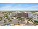 Attractive aerial view showcasing retail shops, accessible parking, and pedestrian-friendly streetscape at 1316 S Minneola Ln, Gilbert, AZ 85296