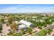 Expansive aerial view highlighting the Barnone craft beverage collective surrounded by lush greenary and city skyline at 1316 S Minneola Ln, Gilbert, AZ 85296