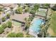 Aerial view of community pool, tennis courts, putting green, and shaded picnic areas at 1316 S Minneola Ln, Gilbert, AZ 85296