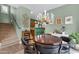 Chic dining area featuring a round table, stylish seating, and natural light, perfect for entertaining and dining at 1316 S Minneola Ln, Gilbert, AZ 85296