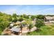 Scenic aerial view of a park with a playground, basketball court, walking paths, and picnic tables at 1316 S Minneola Ln, Gilbert, AZ 85296