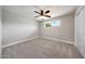 Bright bedroom featuring neutral paint, carpet, ceiling fan, and window at 1320 E Butler Dr, Phoenix, AZ 85020