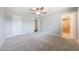 Bedroom with carpet, ceiling fan and access to the attached bathroom at 1320 E Butler Dr, Phoenix, AZ 85020