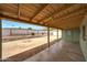 A covered patio overlooking the backyard at 1320 E Butler Dr, Phoenix, AZ 85020