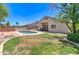 Enjoy this backyard with a refreshing pool, patio, and lush greenery, creating the perfect space for outdoor living and entertaining at 14298 W Amelia Ave, Goodyear, AZ 85395
