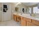 Spacious bathroom with double sink vanity and walk-in shower at 14298 W Amelia Ave, Goodyear, AZ 85395