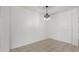 Cozy dining space with tile flooring and a decorative chandelier at 16938 N Verde Pl, Maricopa, AZ 85138