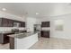 Kitchen area boasting granite countertops, stainless appliances, and ample storage at 16938 N Verde Pl, Maricopa, AZ 85138