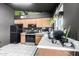 A well-equipped kitchen has stainless steel appliances and laminate countertops at 18427 N 32Nd Ln, Phoenix, AZ 85053