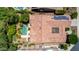 Drone shot showing a backyard pool and spa with mature landscaping at 30135 N 129Th Gln, Peoria, AZ 85383