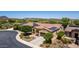 A desert home with solar panels and professional xeriscape landscaping at 30135 N 129Th Gln, Peoria, AZ 85383