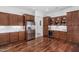 Gourmet kitchen boasts stainless steel appliances, abundant cabinet storage, and a wine refrigerator at 30135 N 129Th Gln, Peoria, AZ 85383
