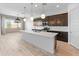 Stylish kitchen with a large island, stainless steel appliances, and ample cabinet space at 3260 W Caleb Rd, Phoenix, AZ 85083