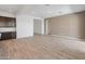 Spacious living room with tile floors, neutral walls, recessed lighting, and an open concept design at 3260 W Caleb Rd, Phoenix, AZ 85083