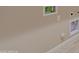 Neutral-colored wall with a few connection outputs for a washer and dryer hookup at 3260 W Caleb Rd, Phoenix, AZ 85083