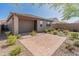Backyard featuring pavers, a covered patio, and desert landscaping at 3264 W Caleb Rd, Phoenix, AZ 85083