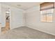 Bedroom with closet; an open door reveals the staircase at 3264 W Caleb Rd, Phoenix, AZ 85083