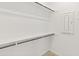 Walk-in closet featuring shelves and rods for optimal storage at 3264 W Caleb Rd, Phoenix, AZ 85083