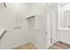 Walk-in closet with rod and shelf; access to the adjacent bathroom at 3264 W Caleb Rd, Phoenix, AZ 85083