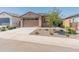 Charming single-story home with a two-car garage and desert landscaping at 3264 W Caleb Rd, Phoenix, AZ 85083