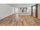 Spacious living area with modern lighting and beautiful wood-look flooring at 3264 W Caleb Rd, Phoenix, AZ 85083