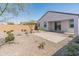 Low maintenance backyard features desert landscaping and privacy wall at 3268 W Caleb Rd, Phoenix, AZ 85083