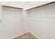 Walk-in closet features carpeted floor and clothing racks on the wall at 3268 W Caleb Rd, Phoenix, AZ 85083