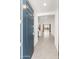 Inviting home entryway with tile flooring leading to an open living area and backyard views at 3268 W Caleb Rd, Phoenix, AZ 85083