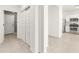 Hallway view leading to the kitchen showcases the home's modern, open-concept design at 3268 W Caleb Rd, Phoenix, AZ 85083