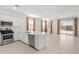 Well-lit kitchen with stainless steel appliances and white countertops at 3268 W Caleb Rd, Phoenix, AZ 85083