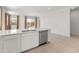 Kitchen island with a stainless steel dishwasher and a double sink, great for food prep and entertaining at 3268 W Caleb Rd, Phoenix, AZ 85083