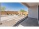 View of backyard featuring desert landscaping and a brick privacy wall at 3268 W Caleb Rd, Phoenix, AZ 85083