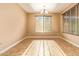The dining room boasts tile flooring and an abundance of natural light at 3443 E Jasper Dr, Gilbert, AZ 85296