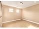 Empty flex room featuring sleek floors, recessed lighting, and neutral color palette at 3443 E Jasper Dr, Gilbert, AZ 85296