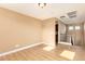 This flex room features hardwood floors, recessed lighting, and neutral color palette at 3443 E Jasper Dr, Gilbert, AZ 85296