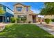 Charming two-story home featuring a well-manicured lawn and inviting curb appeal at 3443 E Jasper Dr, Gilbert, AZ 85296