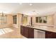 Modern kitchen featuring a center island, granite countertops and stainless steel appliances at 3443 E Jasper Dr, Gilbert, AZ 85296