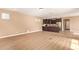 Spacious living room with hardwood floors and a view of the kitchen at 3443 E Jasper Dr, Gilbert, AZ 85296