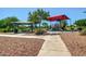 A fun filled playground featuring lots of play area under a shaded canopy at 3443 E Jasper Dr, Gilbert, AZ 85296