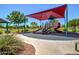 Community playground with a red canopy and slides offers a fun outdoor space at 3443 E Jasper Dr, Gilbert, AZ 85296