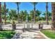 Community splash pad with palm trees, a refreshing escape for families at 3443 E Jasper Dr, Gilbert, AZ 85296