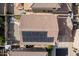 A high aerial view showcases a roof with solar panels, indicating energy efficiency and modern amenities at 3488 S Bowman Rd, Apache Junction, AZ 85119