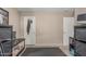 Bright, minimalist bedroom with neutral tones, featuring a lizard tank and ample closet space at 3488 S Bowman Rd, Apache Junction, AZ 85119
