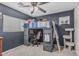 Cozy bedroom with a comfortable loft bed, desk area, and charming decor at 3488 S Bowman Rd, Apache Junction, AZ 85119